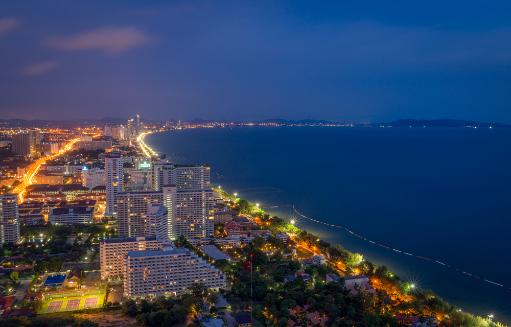 Pattaya City and Sea with suset, Thailand. Pattaya city skyline and pier at sunset in Pattaya Chonburi Thailand