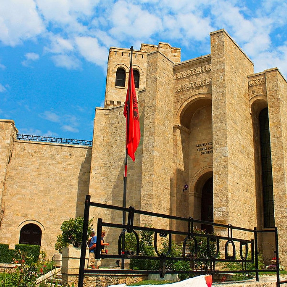 Albanian souvenirs and traditional costumes for sale at Kruja castle.