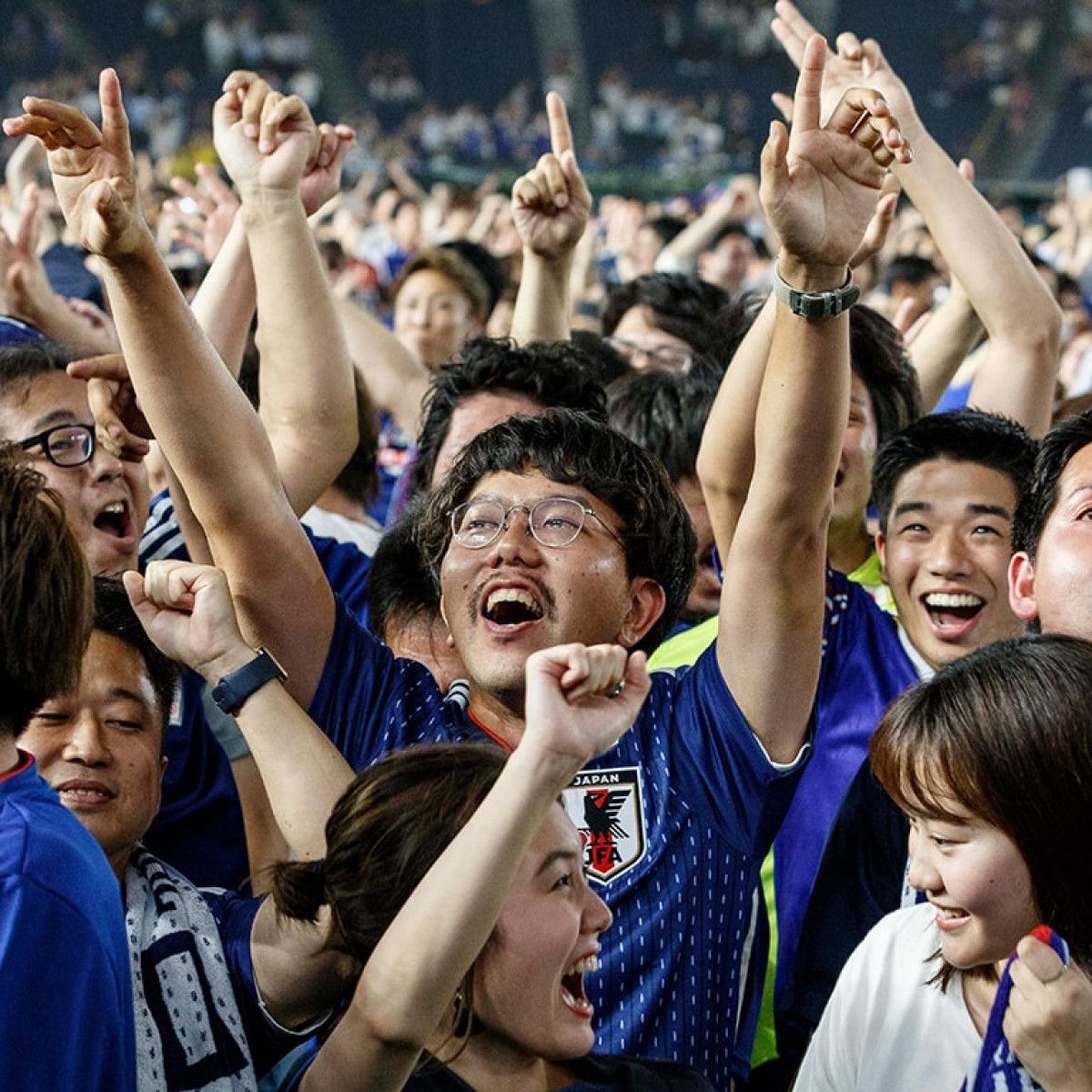 Japan's World Cup fans cleaned up the stadium after they won. Now others  are doing it. - Vox