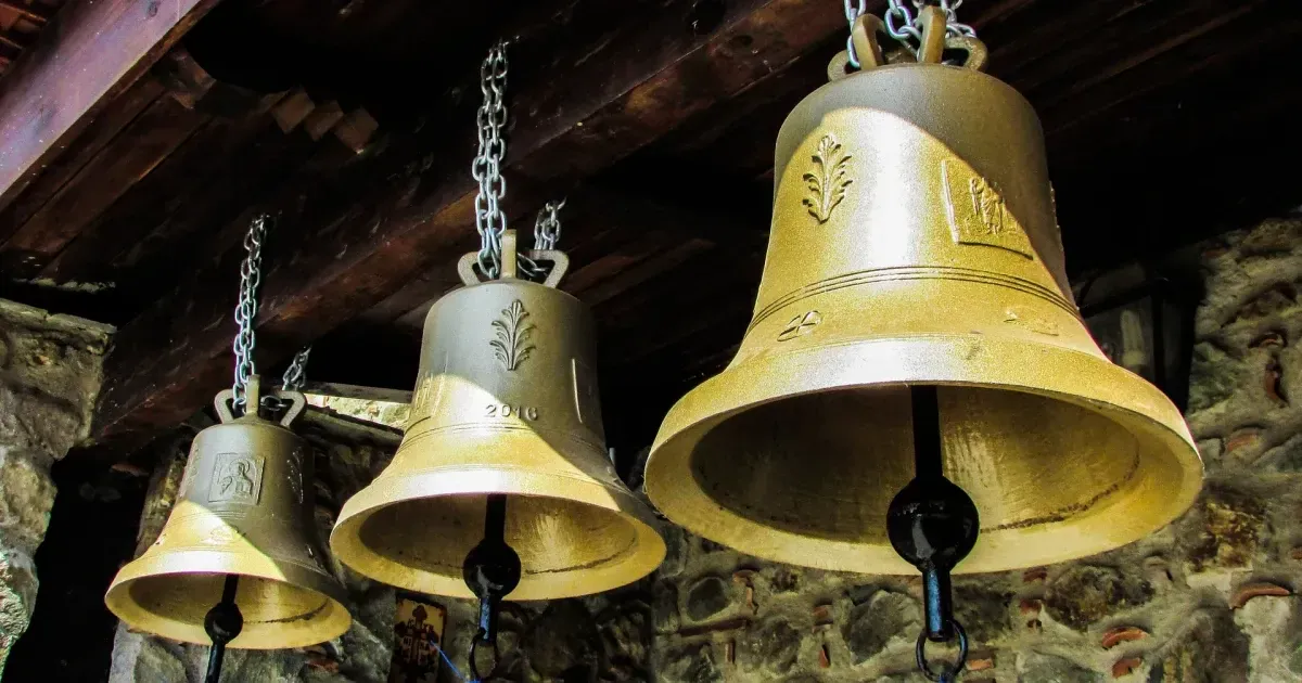 two small bell-ringing church bell close-up, automatically an electronic bell  ringer Stock Photo - Alamy