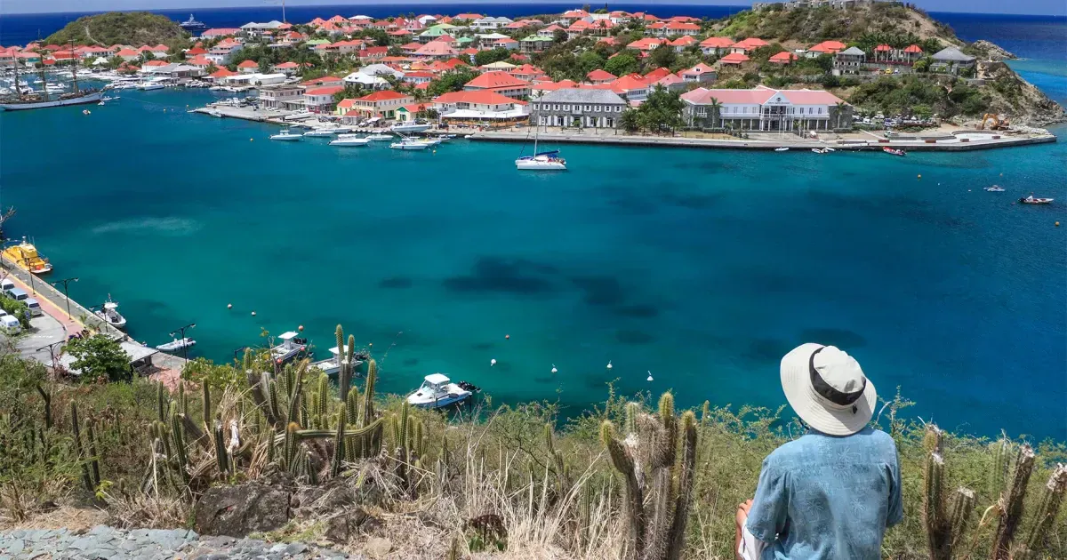 Elevated view over pretty red rooftops of town and sea, Gustavia