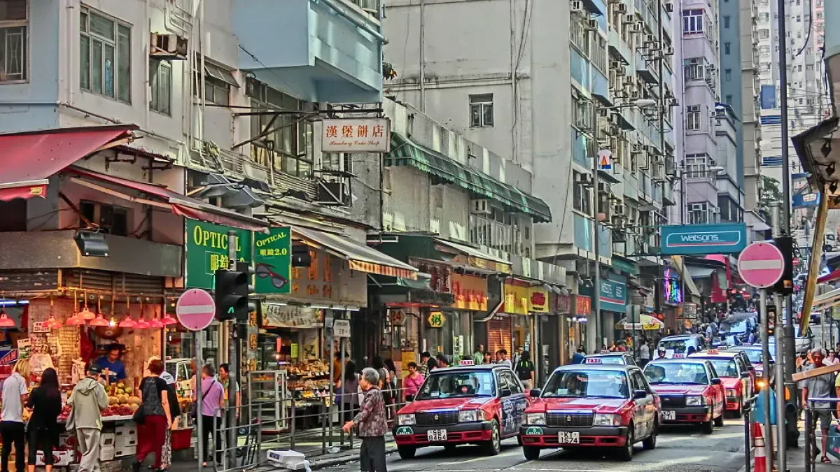 A pedestrian walks past a De Beers SA store in Hong Kong, China