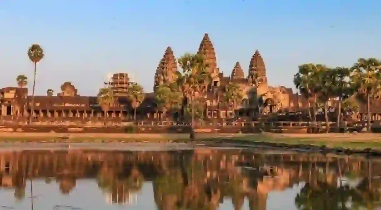 The reflection of Angor Wats shadow on the basin, ancient architecture in Cambodia