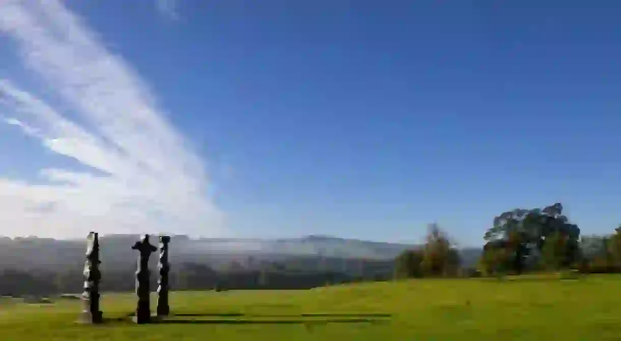 Henry Moore in the Country Park. Reproduced by Permission of The Henry Moore Foundation