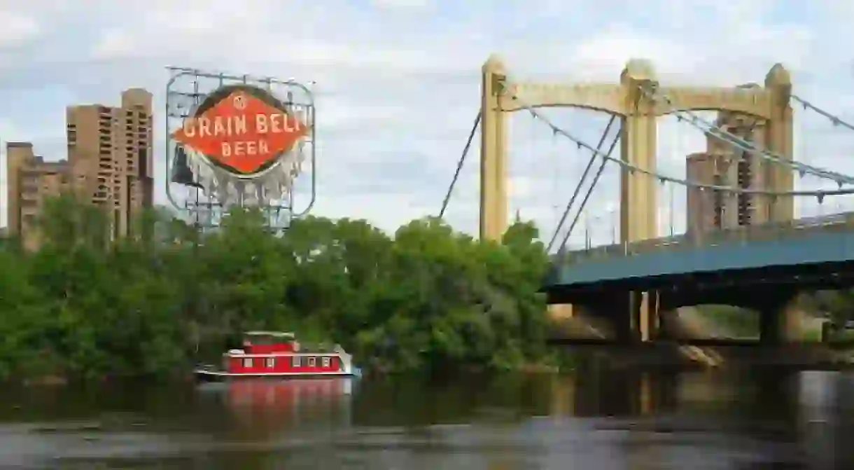 The iconic Grain Belt Beer sign sits on the edge of Minneapolis North Loop along the Mississippi River