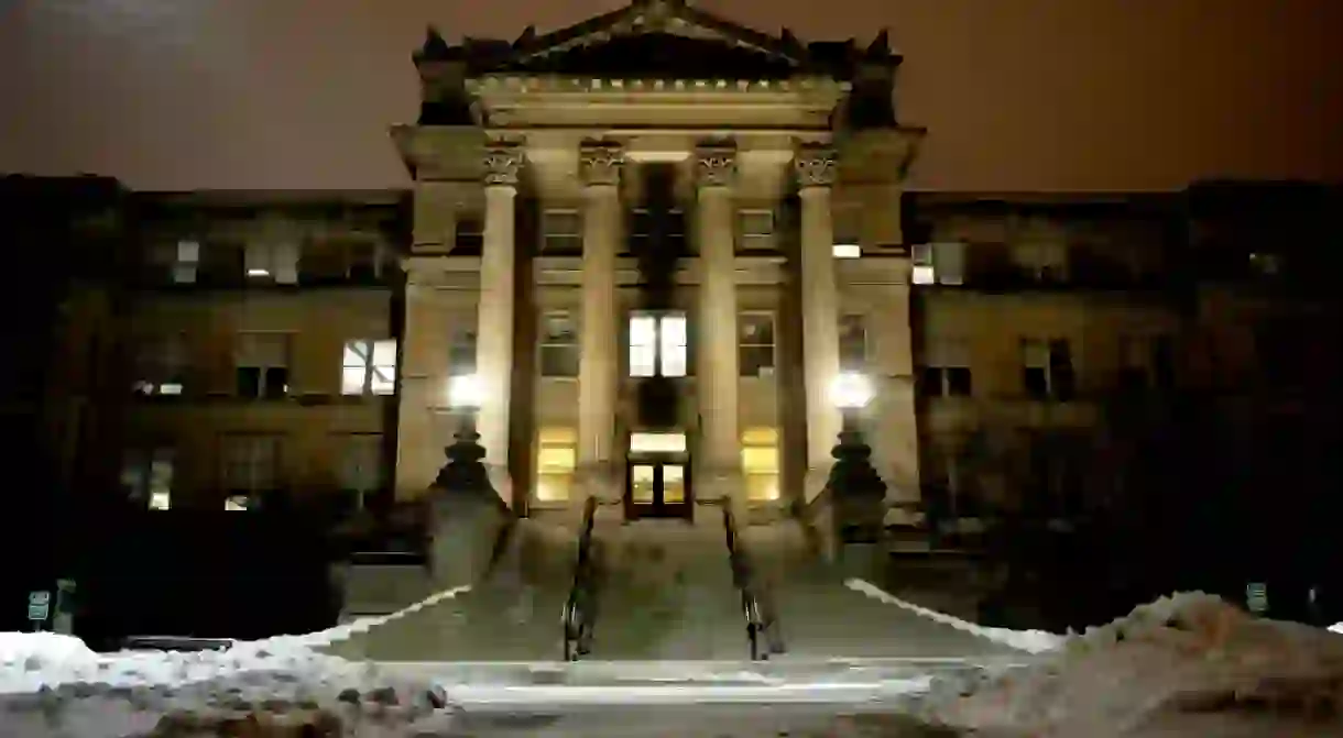 Iowa State Universitys Beardshear Hall during snowfall in Ames, Iowa