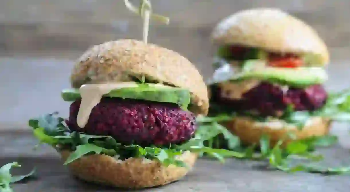 Vegetarian beetroot burgers with arugula and avocado