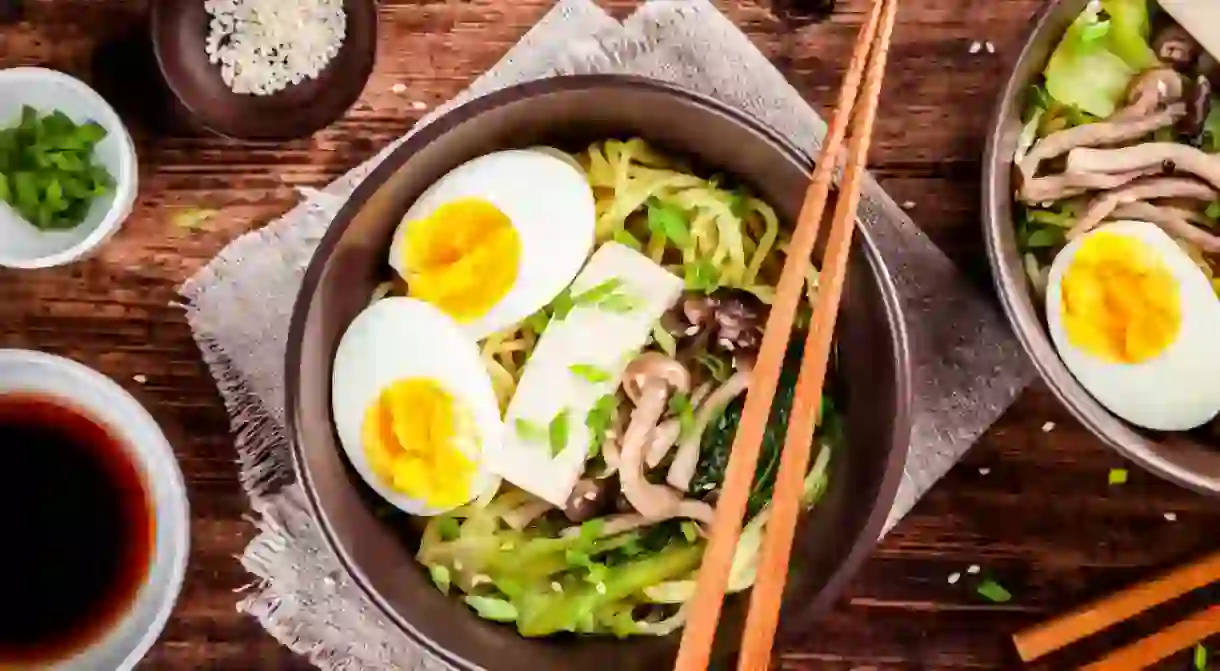 Asian miso ramen noodles with eggs, tofu and shimeji mushrooms