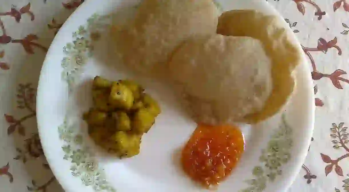 Luchi with Aloo Dum