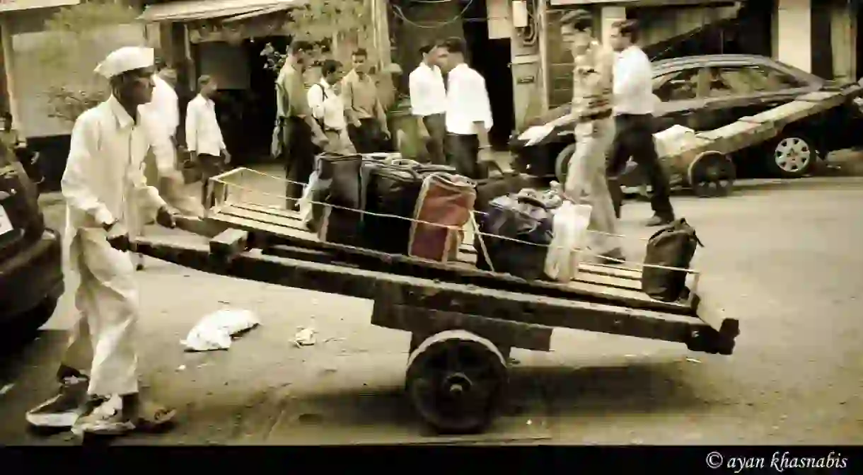 A dabbawala and his wooden crate