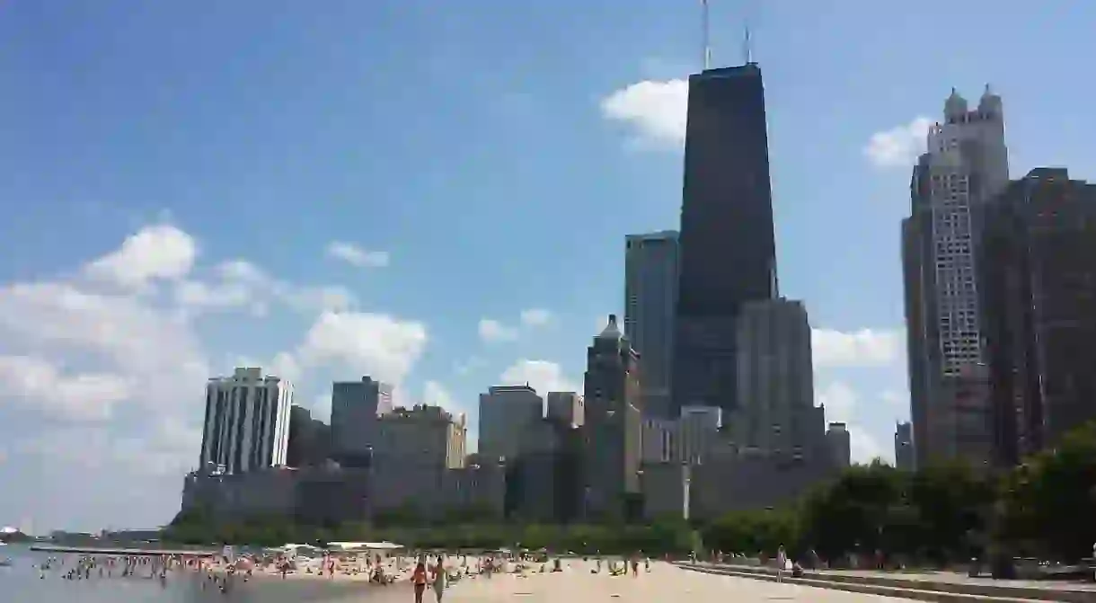 Oak Street Beach offers up hot, sandy fun with a towering backdrop.