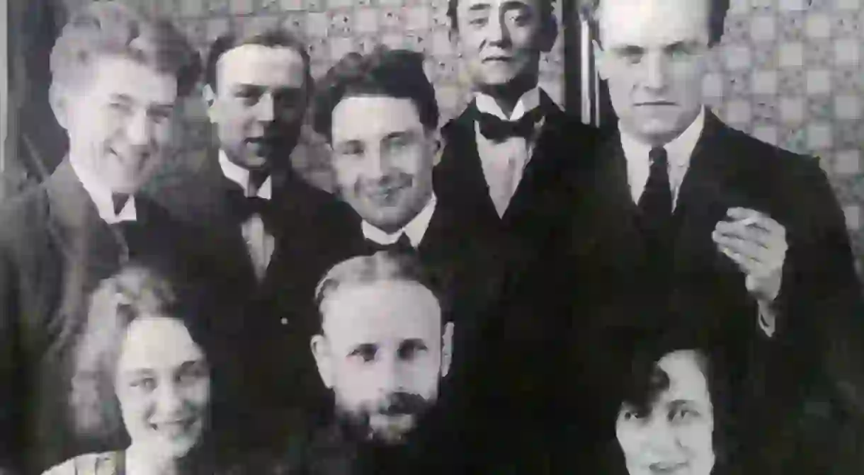 A group of Belgian artists with surrealists René Margritte and E.L.T. Mesens at the top left