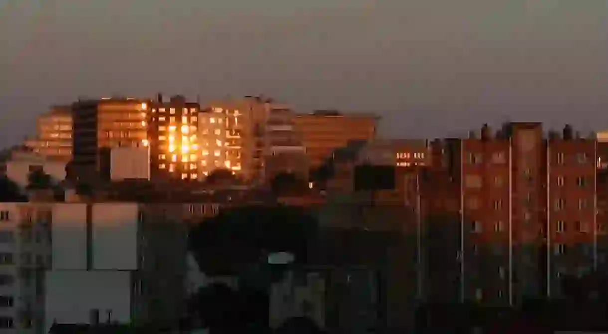 Sunrise reflections on buildings of Avenue Louise, Ixelles, Belgium