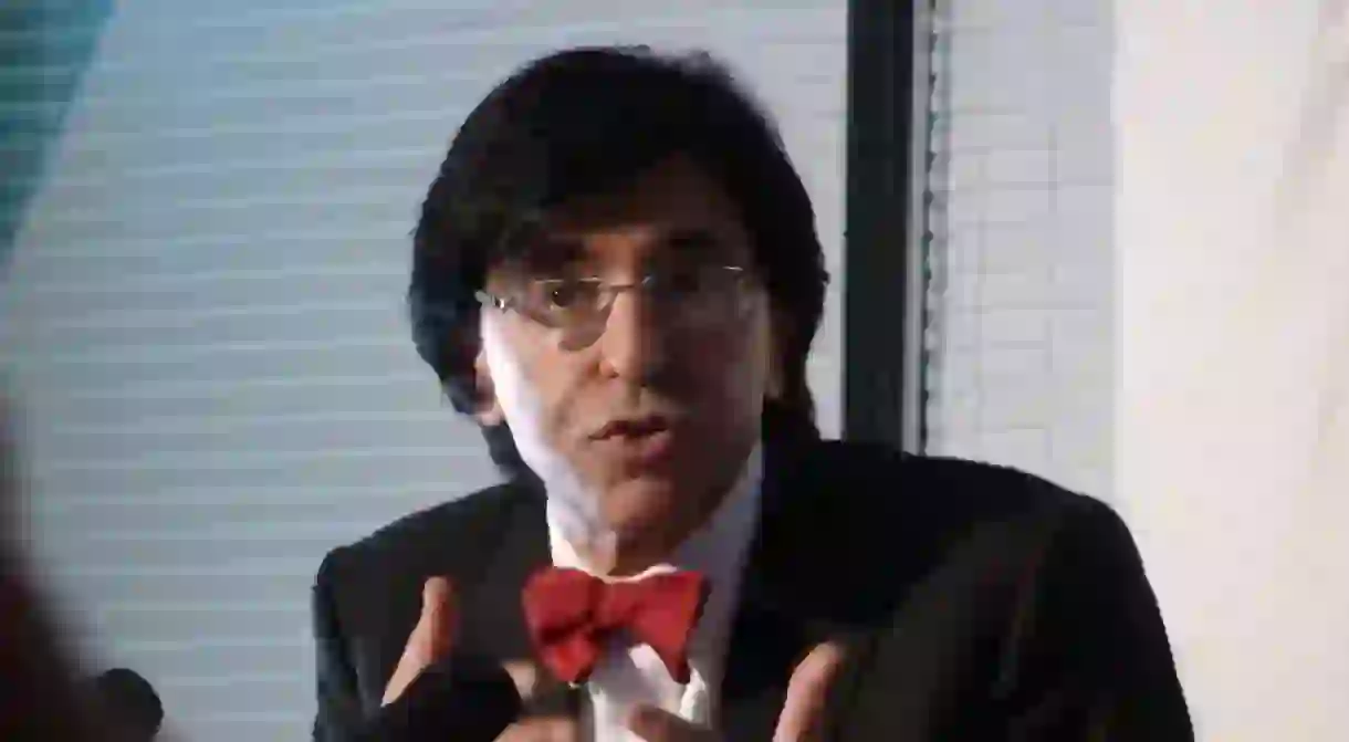 Elio Di Rupo in signature red bow tie