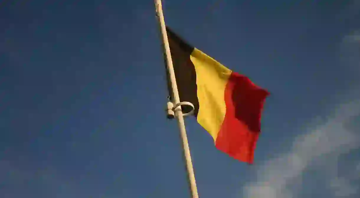 The modern Belgian flag waving in the wind