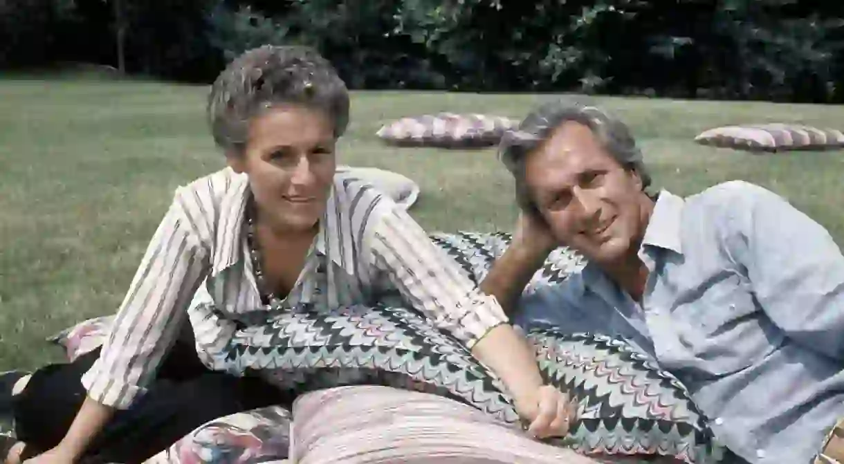 The Italian fashion designer Ottavio Missoni Rosita Missions (Rosita Jelmini) and his wife sitting on the lawn of their mansion. Sumirago (Varese), Italy, July 1975