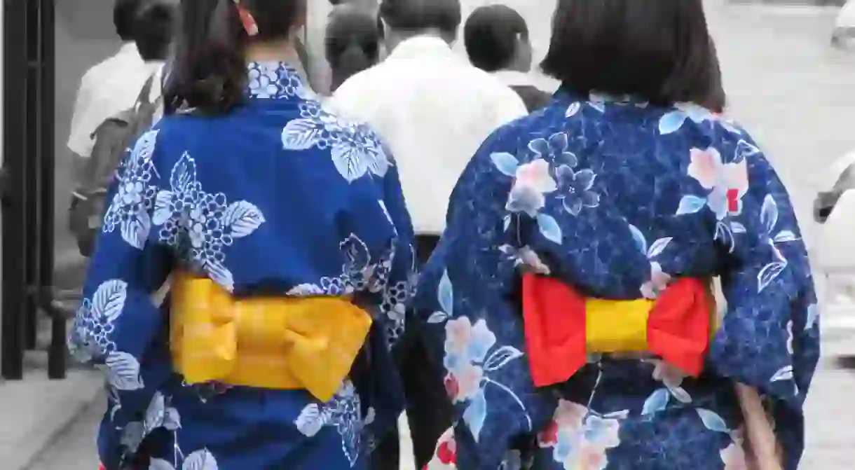 Women in indigo yukata out for a stroll