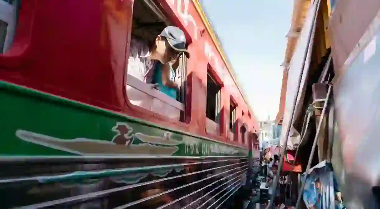 Everything stops at Maeklong Railway Market as a train passes through its centre