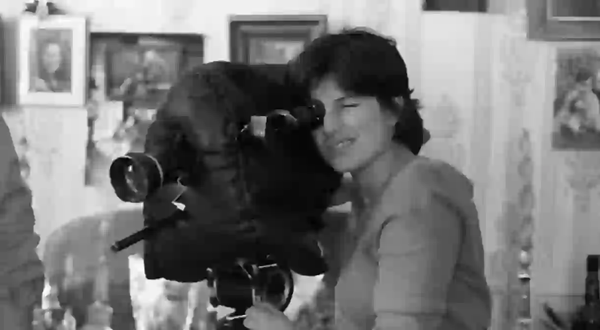 The late director Chantal Akerma sees through her cameras lens