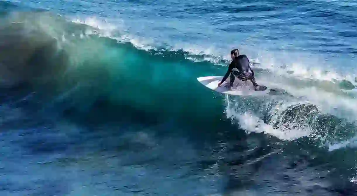 Surfing is one of the many water sports available