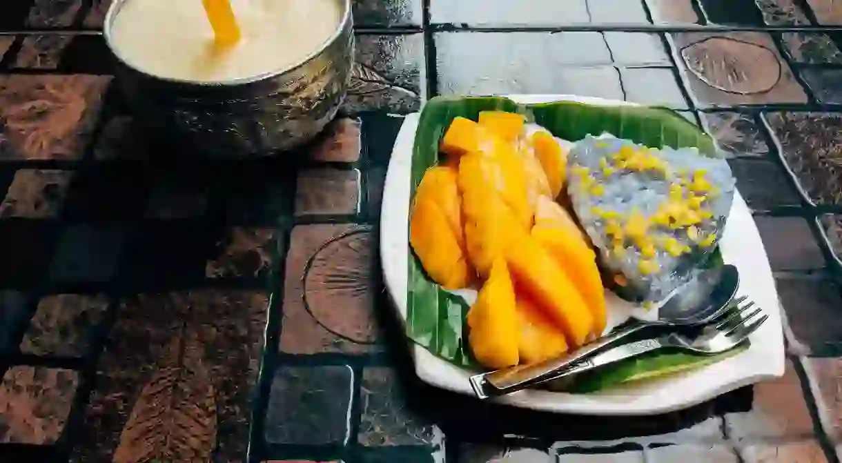 A plate of mango sticky rice is a must while travelling in Thailand