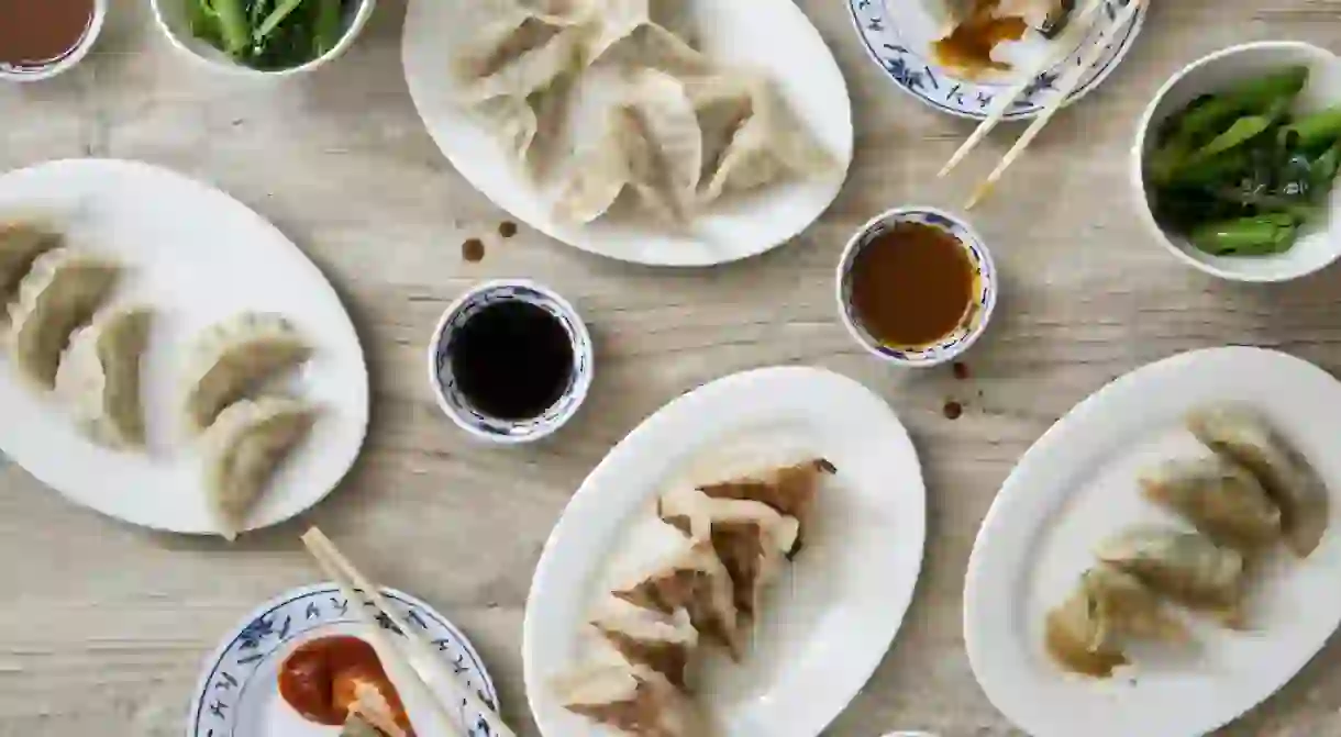 Dumplings are stuffed and carefully pleated