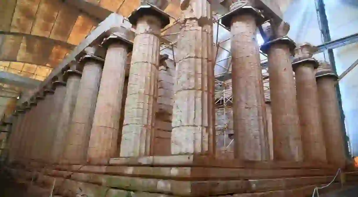 Well preserved ruins of the temple of Apollo protected by large canopy in Bassae, Greece