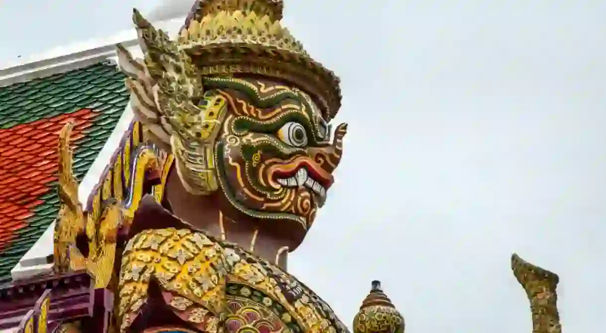 Giant statue at the Emerald Buddha Temple, Bangkok, Thailand