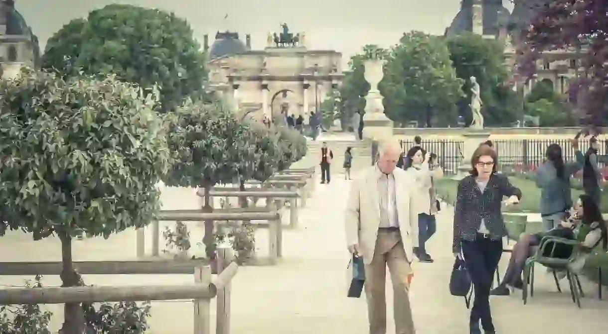 ‘Parisians’ walking in a park │