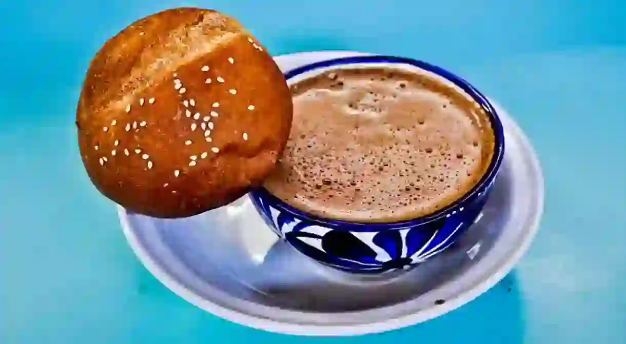 Coffee accompanied by pan de yema