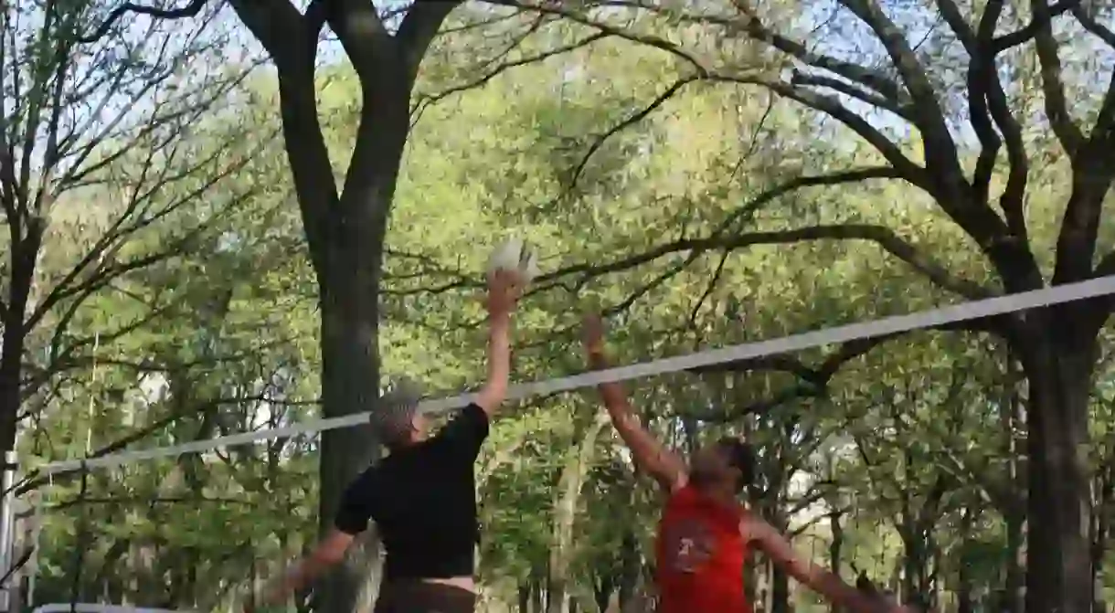 Playing volleyball in Central Park