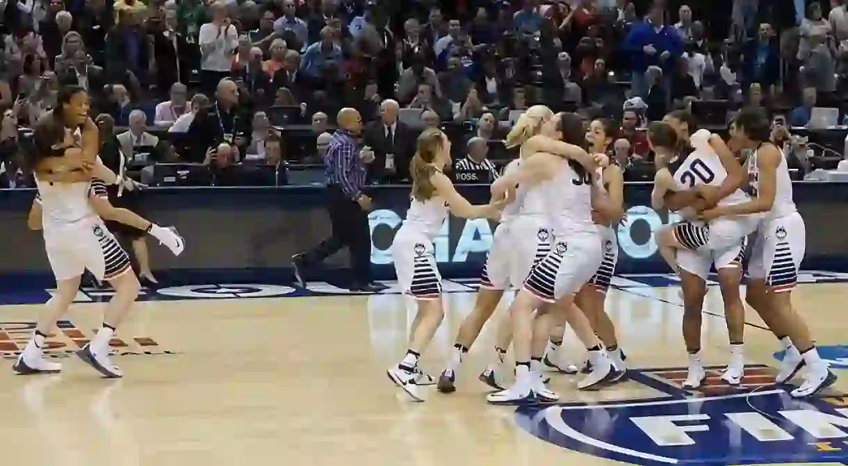 The UConn Huskies, above celebrating their 2016 NCAA championship, havent lost in 100 games