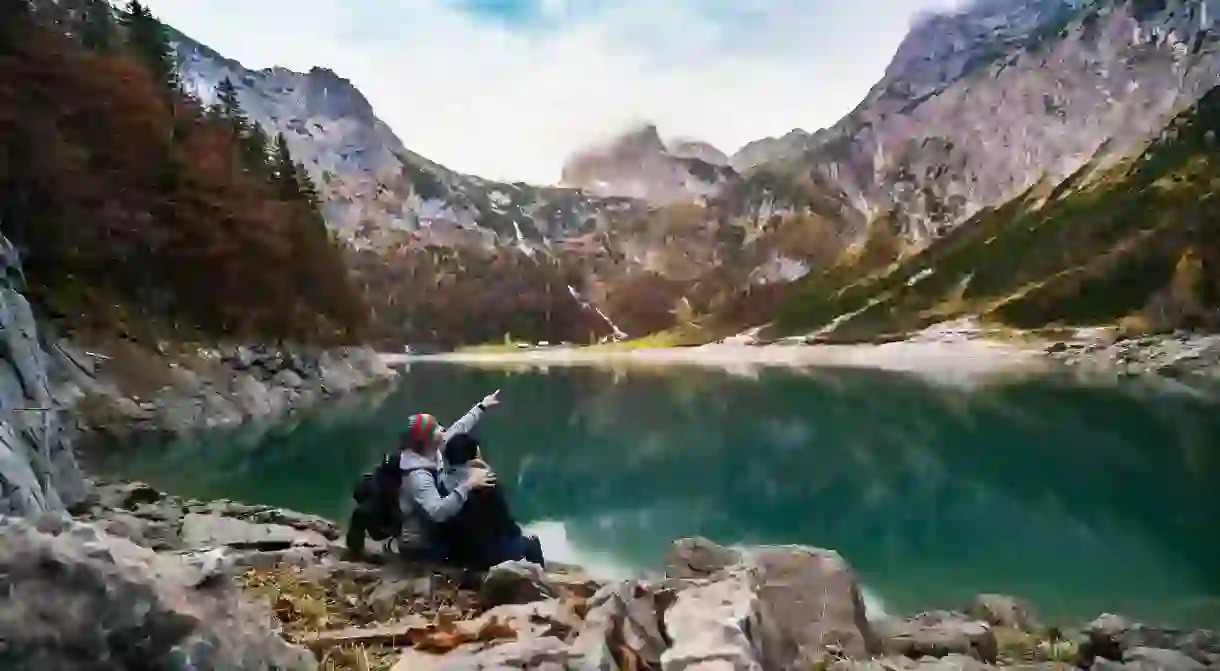 Couple climbing in the Alps │