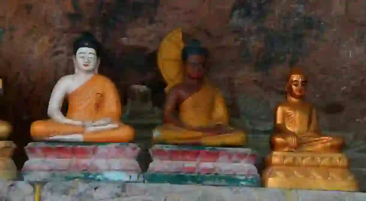 Some Buddhist statues at the base of Wat Preah Ang Thom