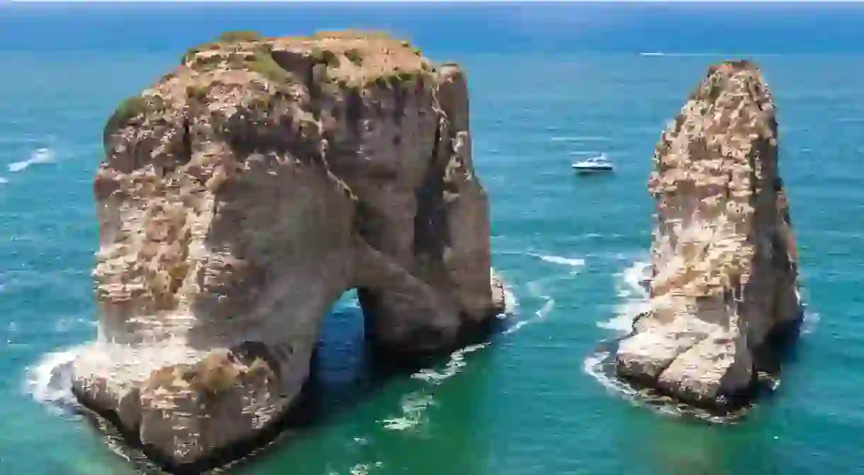 Pigeons Rock limestone island in Beirut, Lebanon