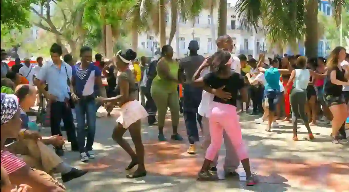 Salsa dancers on a street in Cuba