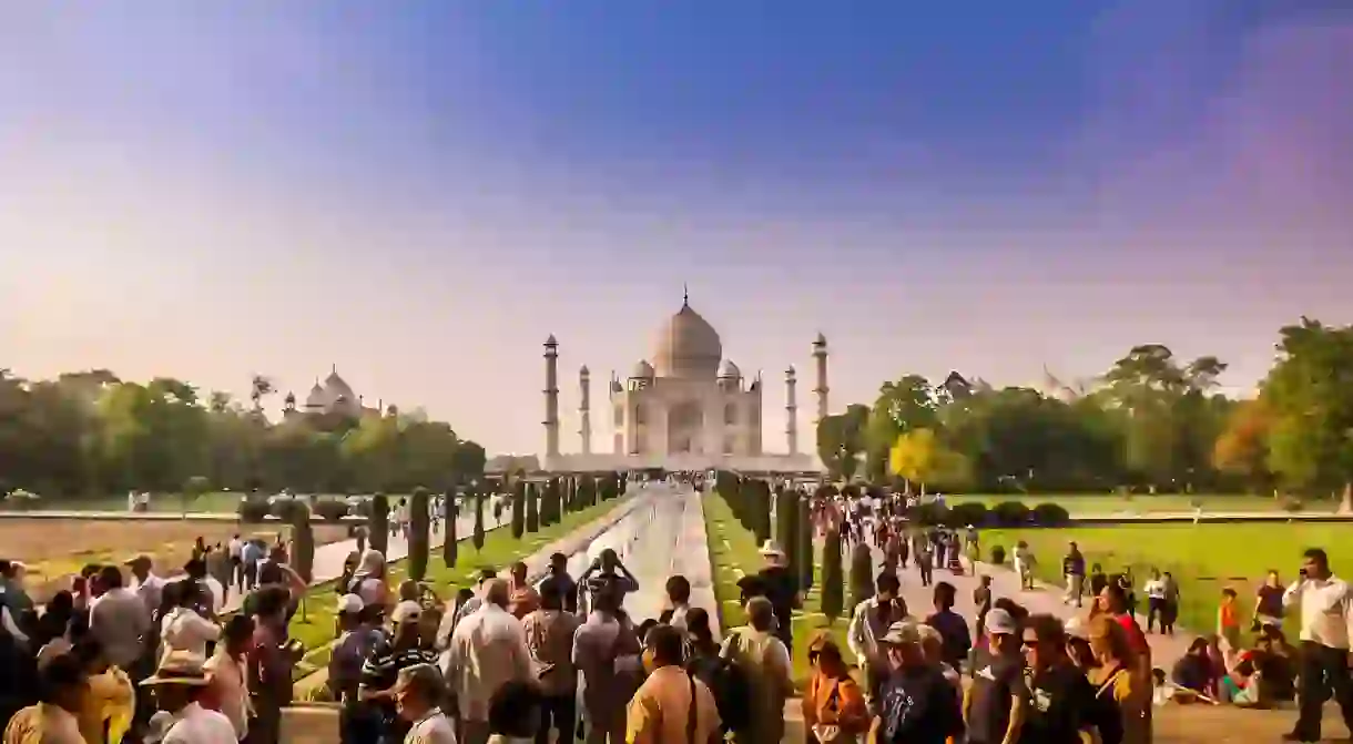 Toursits gazing at the Taj Mahal