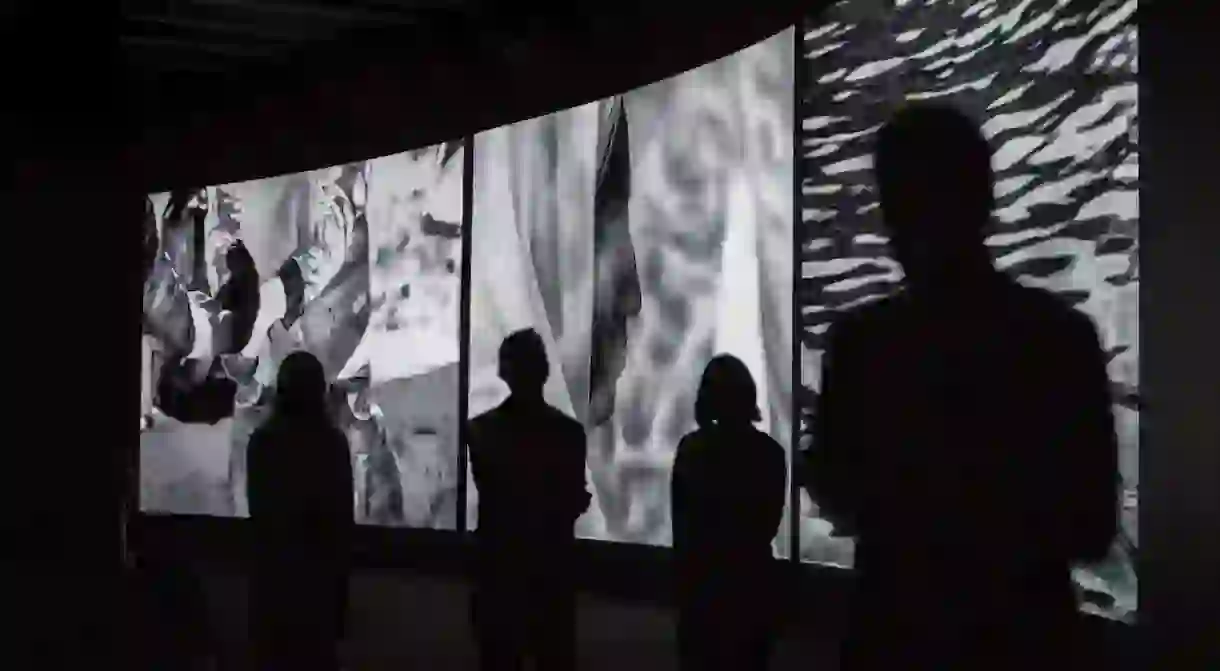 Installation view of Incoming, Richard Mosse in collaboration with Trevor Tweeten and Ben Frost. The Curve, Barbican Centre