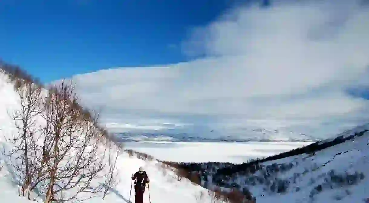 Hiking in the snow with walking poles