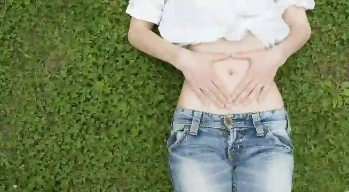 A woman lying in the grass