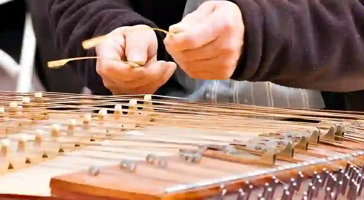 Man playing dulcimer