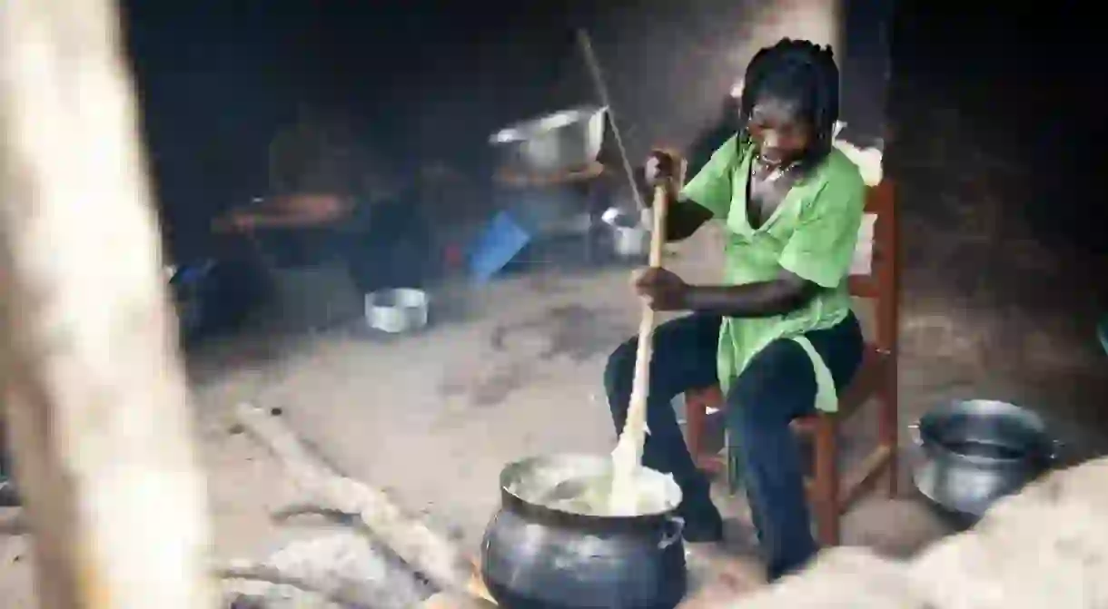 Woman making Banku, (c) Ben Grey / Flickr