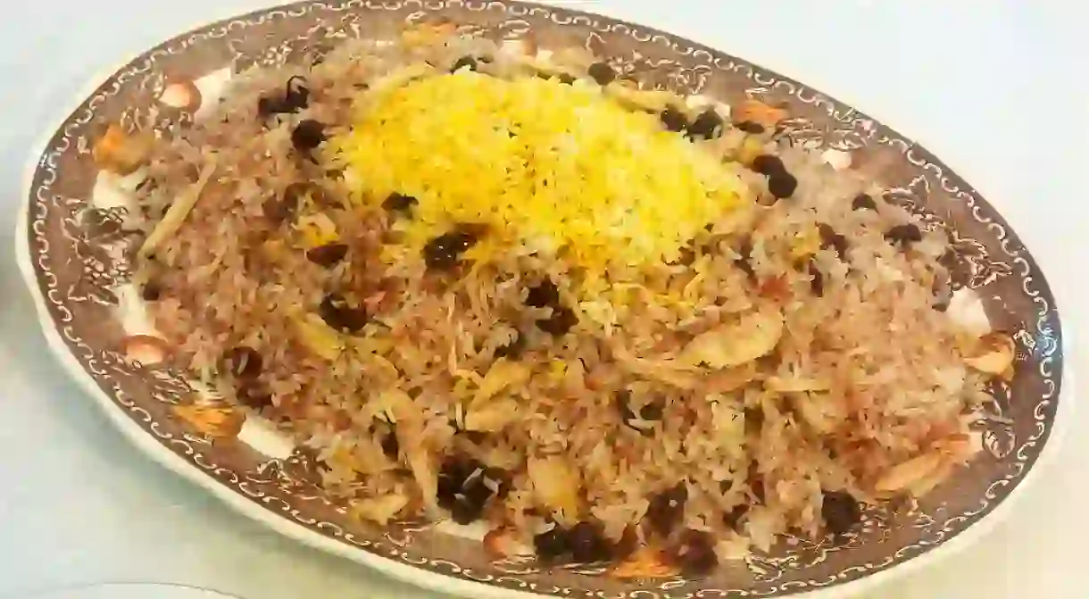 Âlbâloo polo is a sweet rice dish