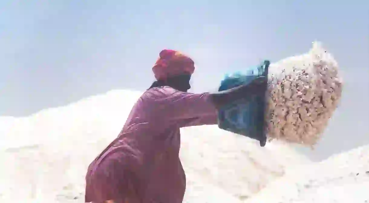 A photo from Gil Mirandas Women of the Salt series on the largest salt mine in Senegal