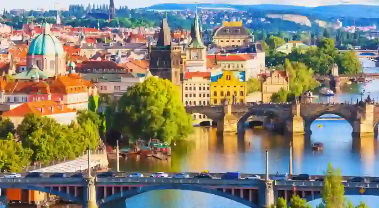 Scenic summer aerial view of the Old Town pier architecture and Charles Bridge over Vltava river in Prague, Czech Republic