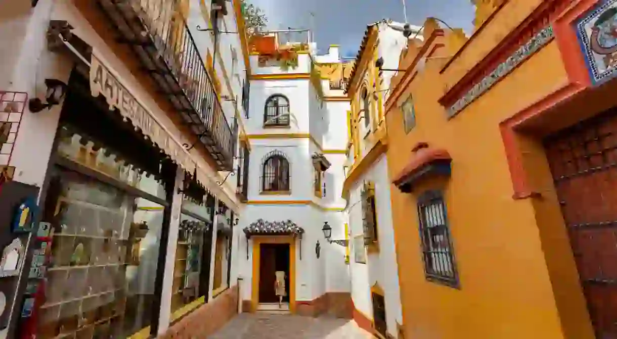 A typical street in the beautiful neighbourhood of Santa Cruz, Seville