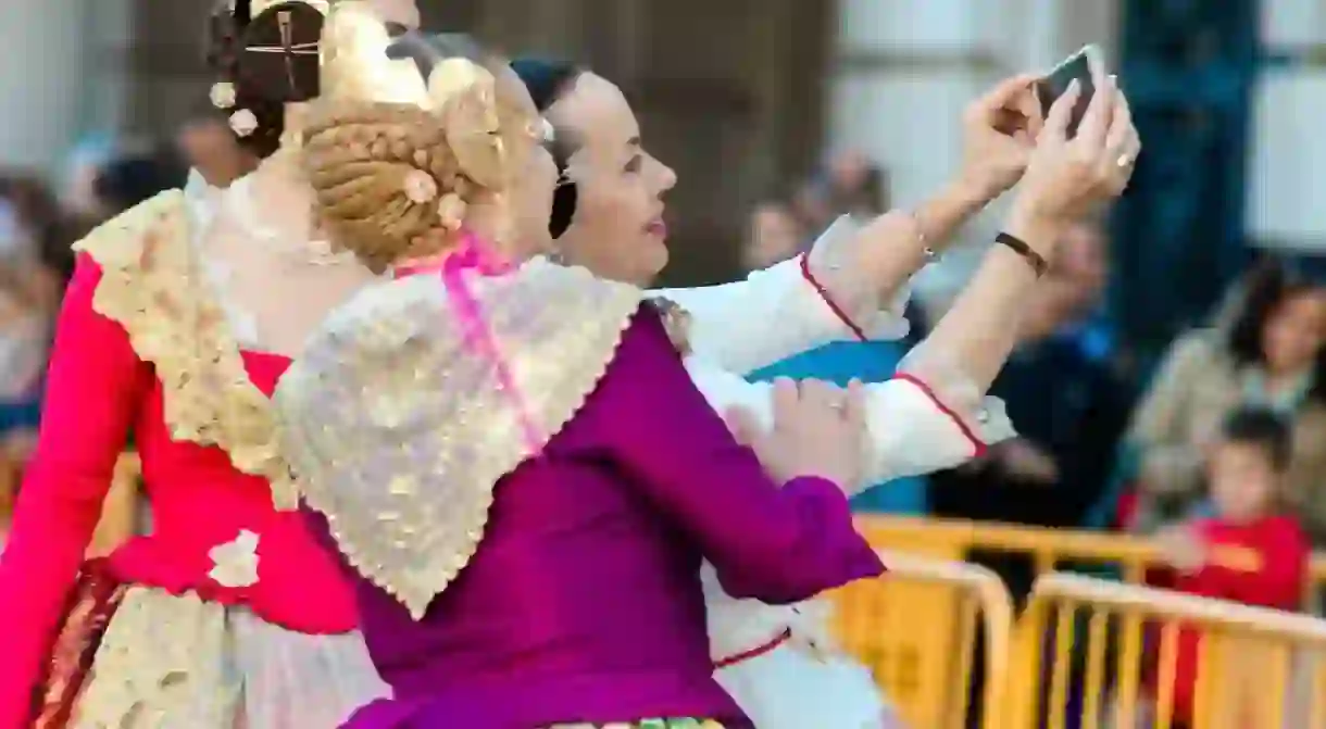 Valencian falleras in traditional dress