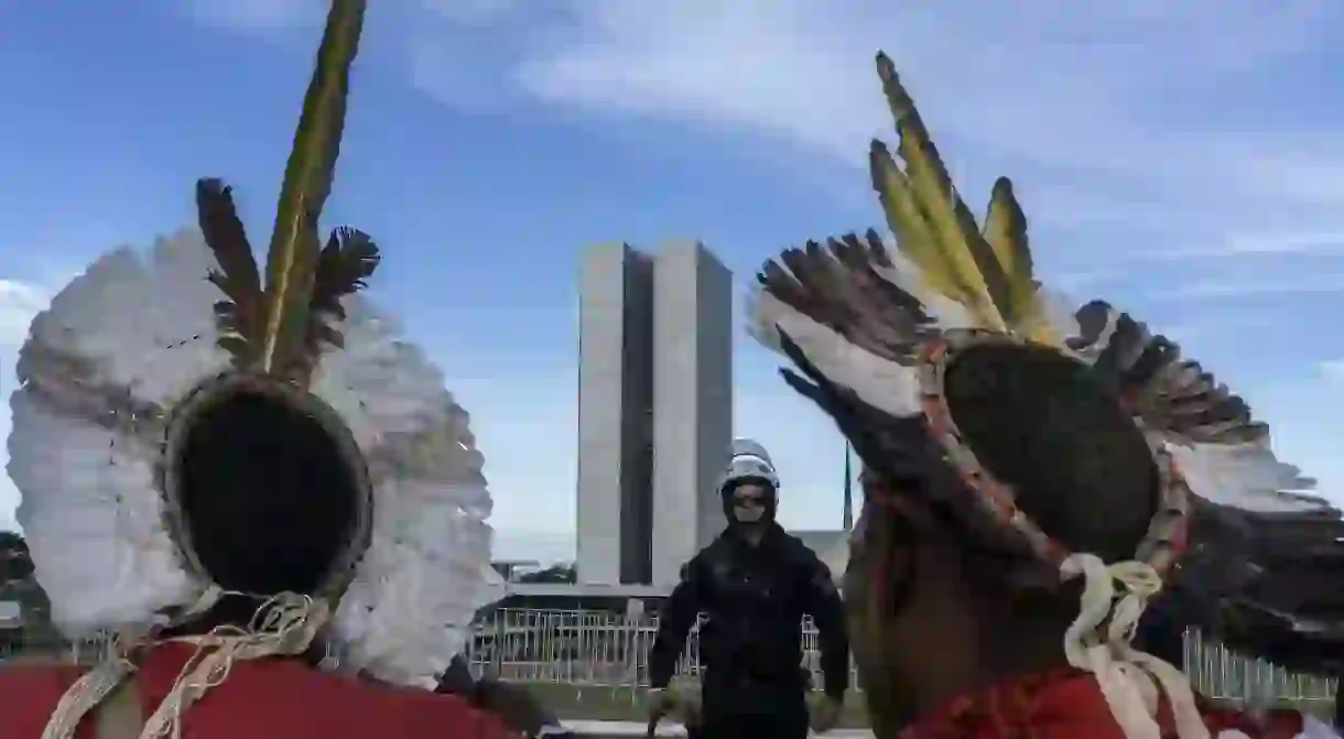 Indigenous activists confronted by police outside Brazils Congress