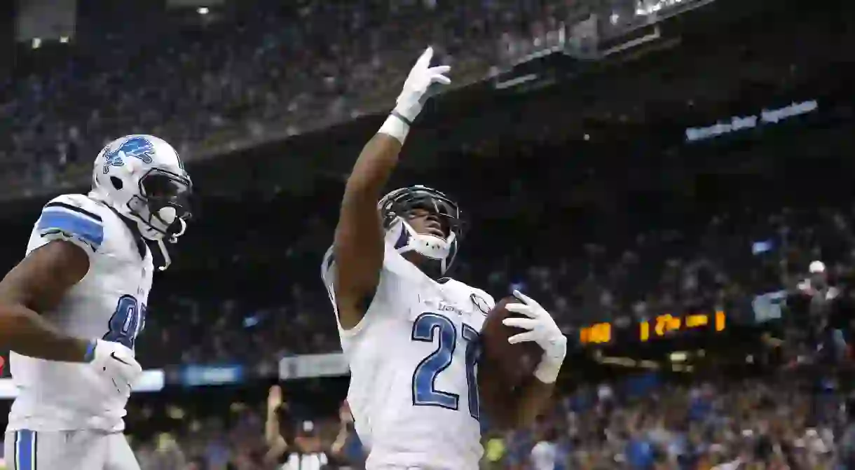 Ameer Abdullah (21) celebrates a TD against the New Orleans Saints