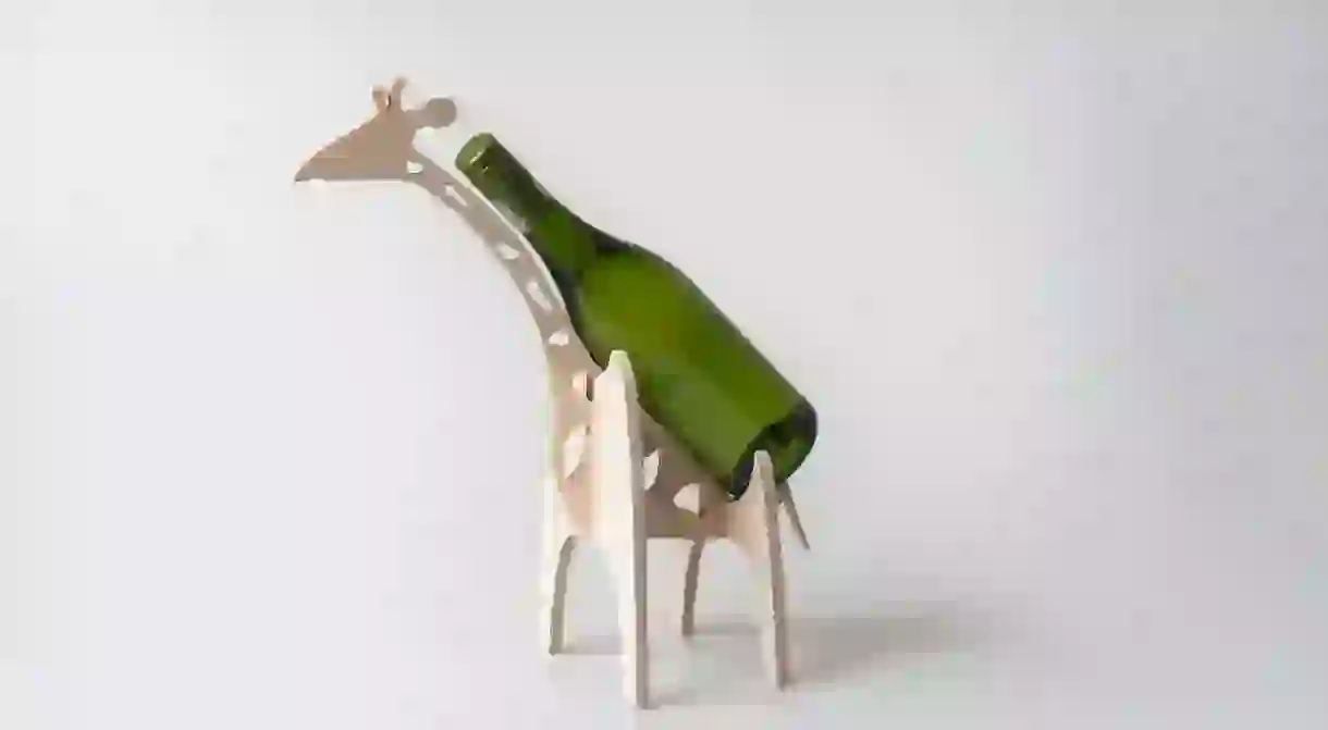 Native Décor creates homeware items with an African feel, like this giraffe wine bottle holder